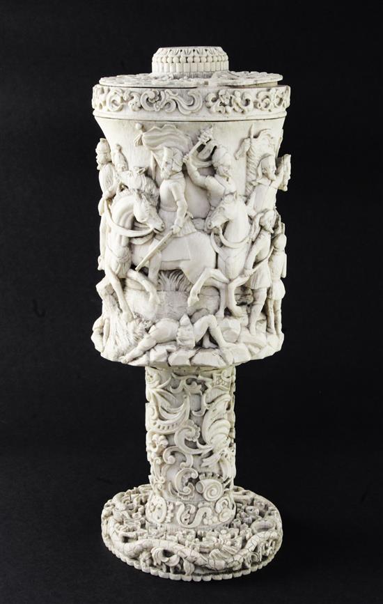 A large 19th century North European carved ivory vase and cover, probably German, 15in.